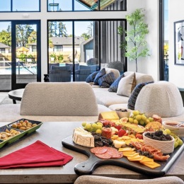 a fruit tray in a large lounge room